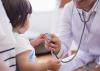 Child being examined in hospital